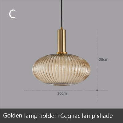 Σχεδιαστής πολυέλαιος σε χρυσό μέταλλο με στρογγυλεμένο φωτιστικό Skalla