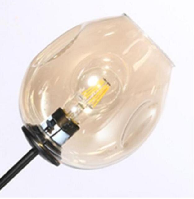 Πολυέλαιος βιομηχανικού σχεδιασμού με κρεμαστά γυάλινα μπαλάκια εσωτερικού χώρου